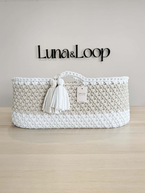 Beige and white crochet Moses basket, side view