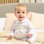 Dandelion Spinning Top Smocked Onesie