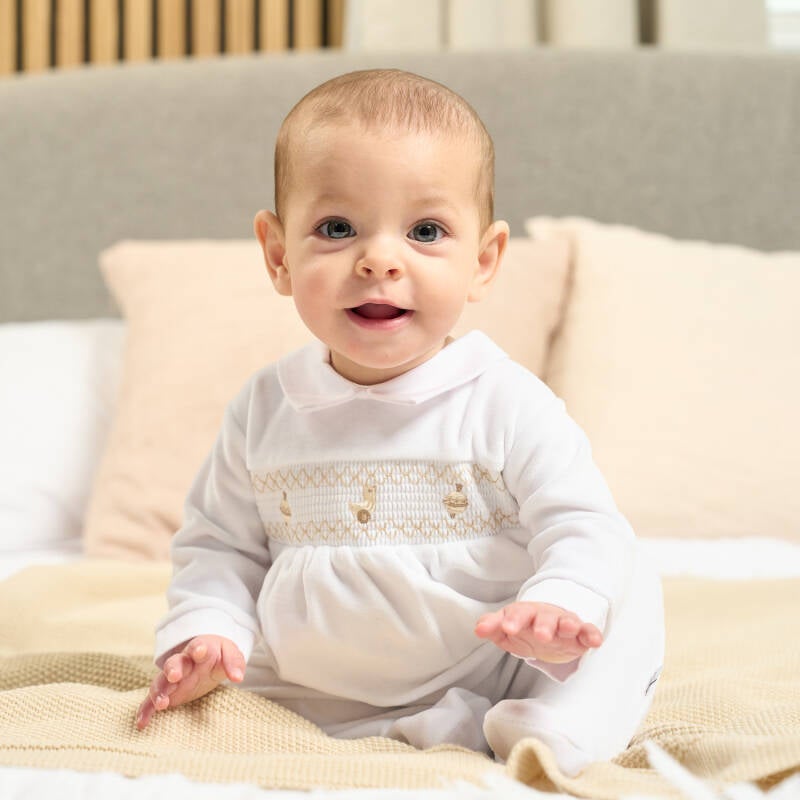 Dandelion Spinning Top Smocked Onesie